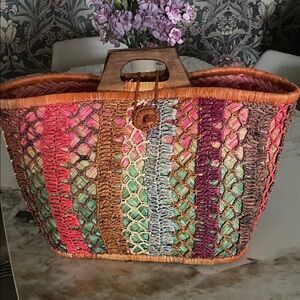 Multi color artisan straw tote.